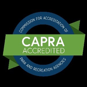 CAPRA ACCREDITED logo, signifying accreditation by the Commission for Accreditation of Park and Recreation Agencies.