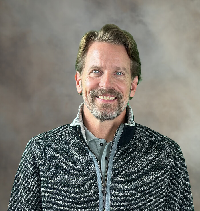 Professional portrait of Chris Wollmuth, Treasurer